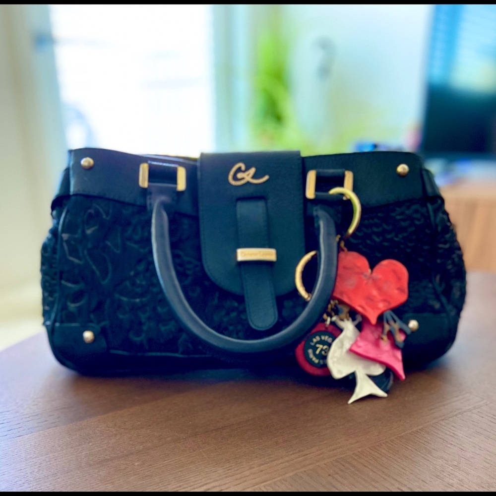 Leather and fur Christian Lacroix purse.